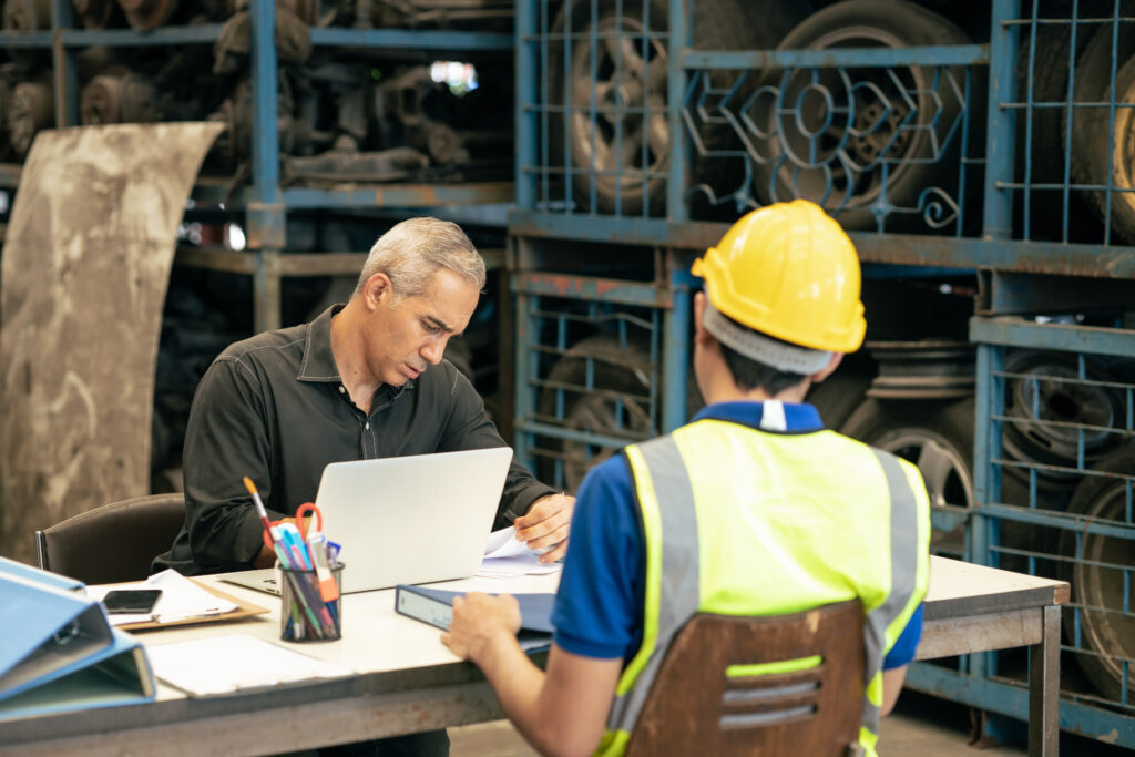 Frontline manager speaks to a financially sick warehouse employee about how his employer benefit Brightside Financial Care can help